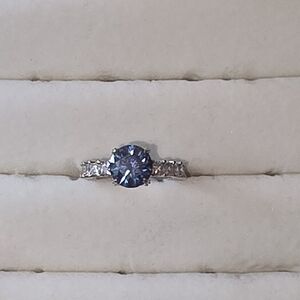 Dazzling Silver Ring with Blue Gemstone